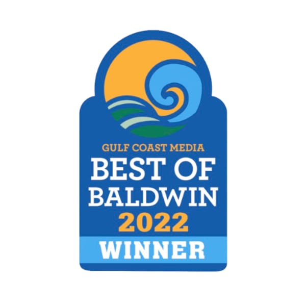 Gulf Coast Media Best of Baldwin 2022 Winner badge with sun and waves graphic.